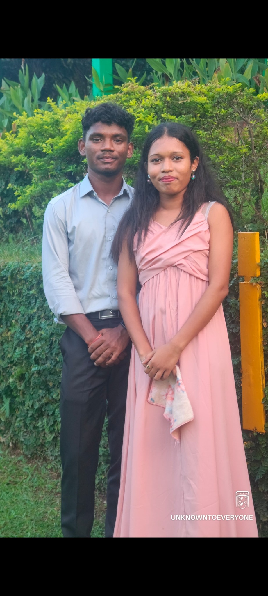 Romantic two-person kiss. The left one gently kisses the right one. Natural pose, warm lighting, cinematic portrait. input